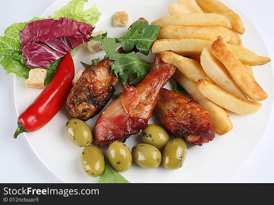 Fast food image hicken legs and salad. Fast food image hicken legs and salad