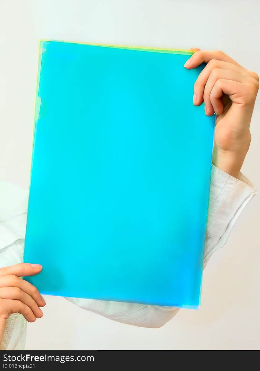 Women hands holding office folders. Women hands holding office folders