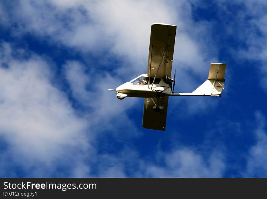 Private aircraft and  blue sky. Private aircraft and  blue sky