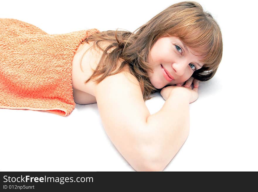 Young pretty woman relaxing and smiling at the spa. Young pretty woman relaxing and smiling at the spa