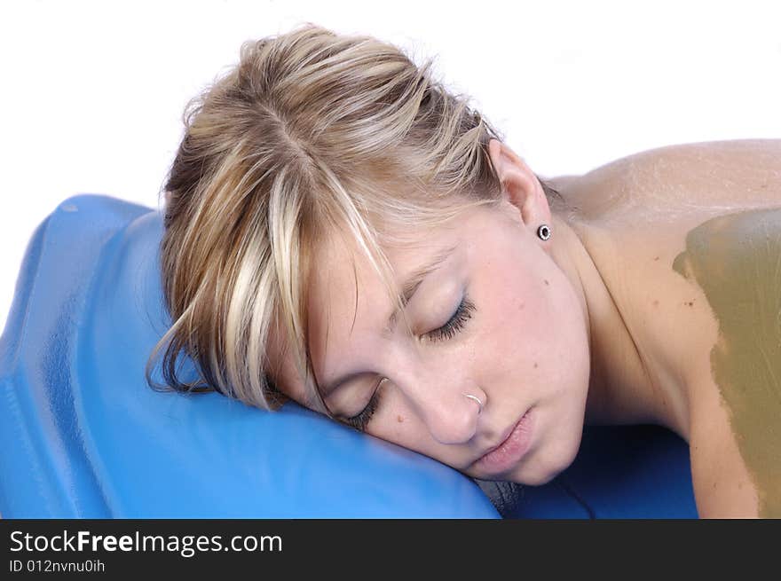 Woman resting in spa between after seaweed body treatment