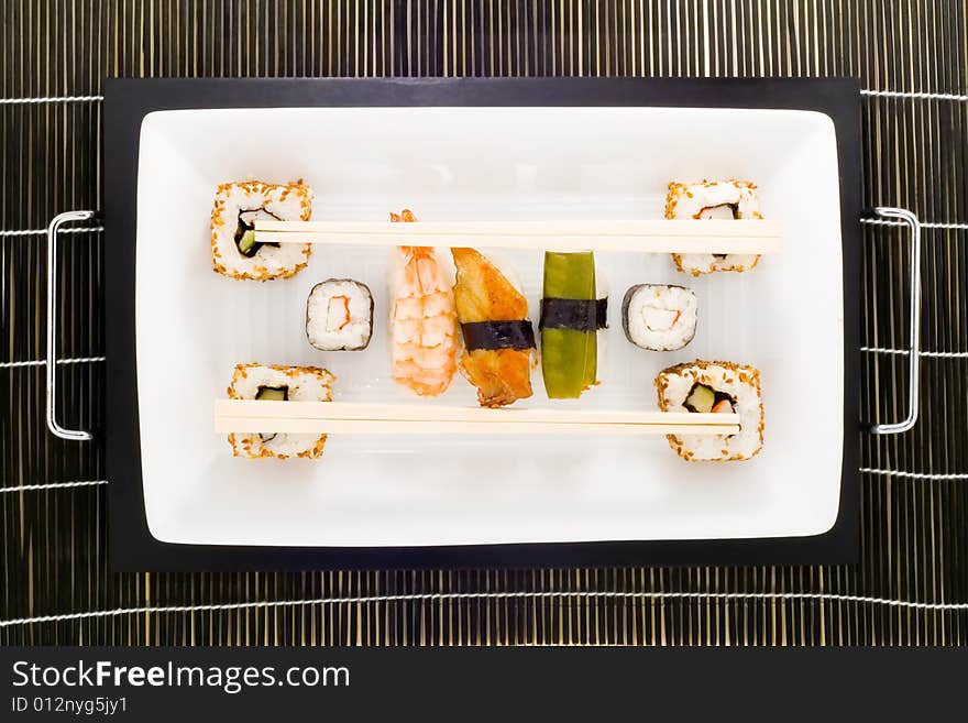 A plate with different kinds of sushi