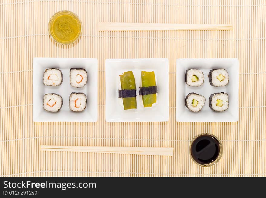 A plate with different kinds of sushi