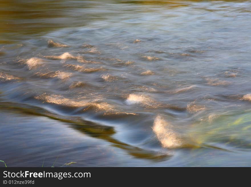 Rift on river. Water landscape. Summer life