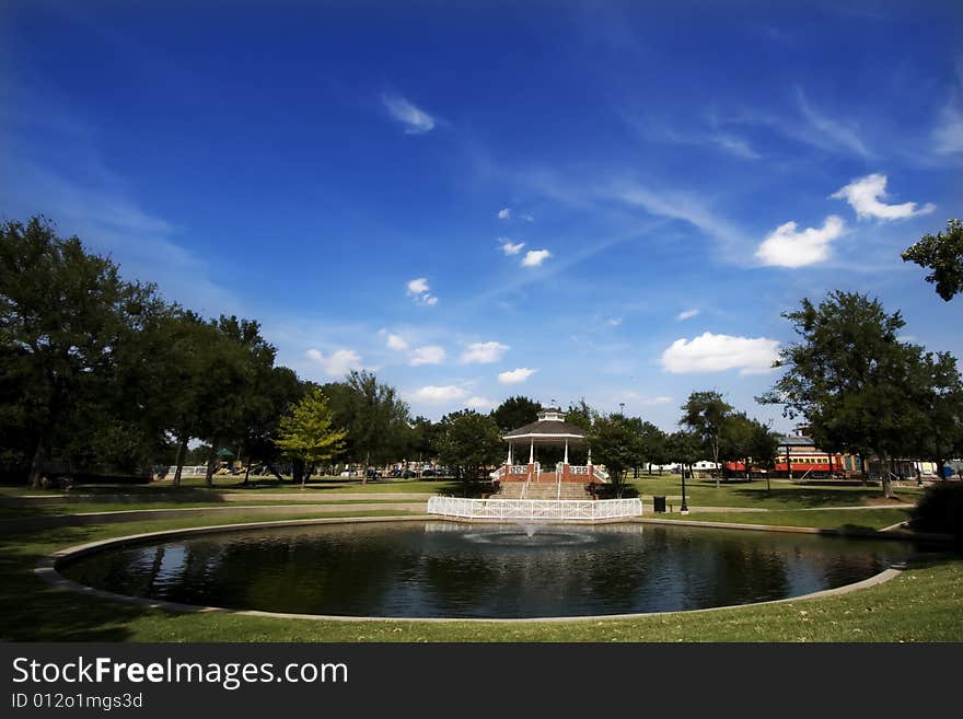 Park Panorama with a Pond and Gazebo