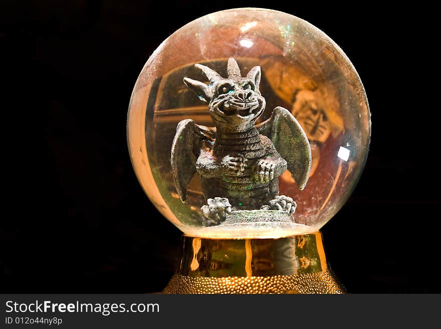 Small Gargoyle captured in a small globe. Small Gargoyle captured in a small globe