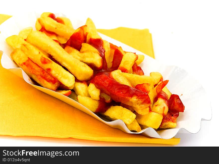 French fries with ketchup - isolated on white background.