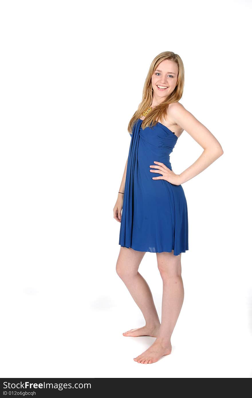 Pretty young woman in short blue dress