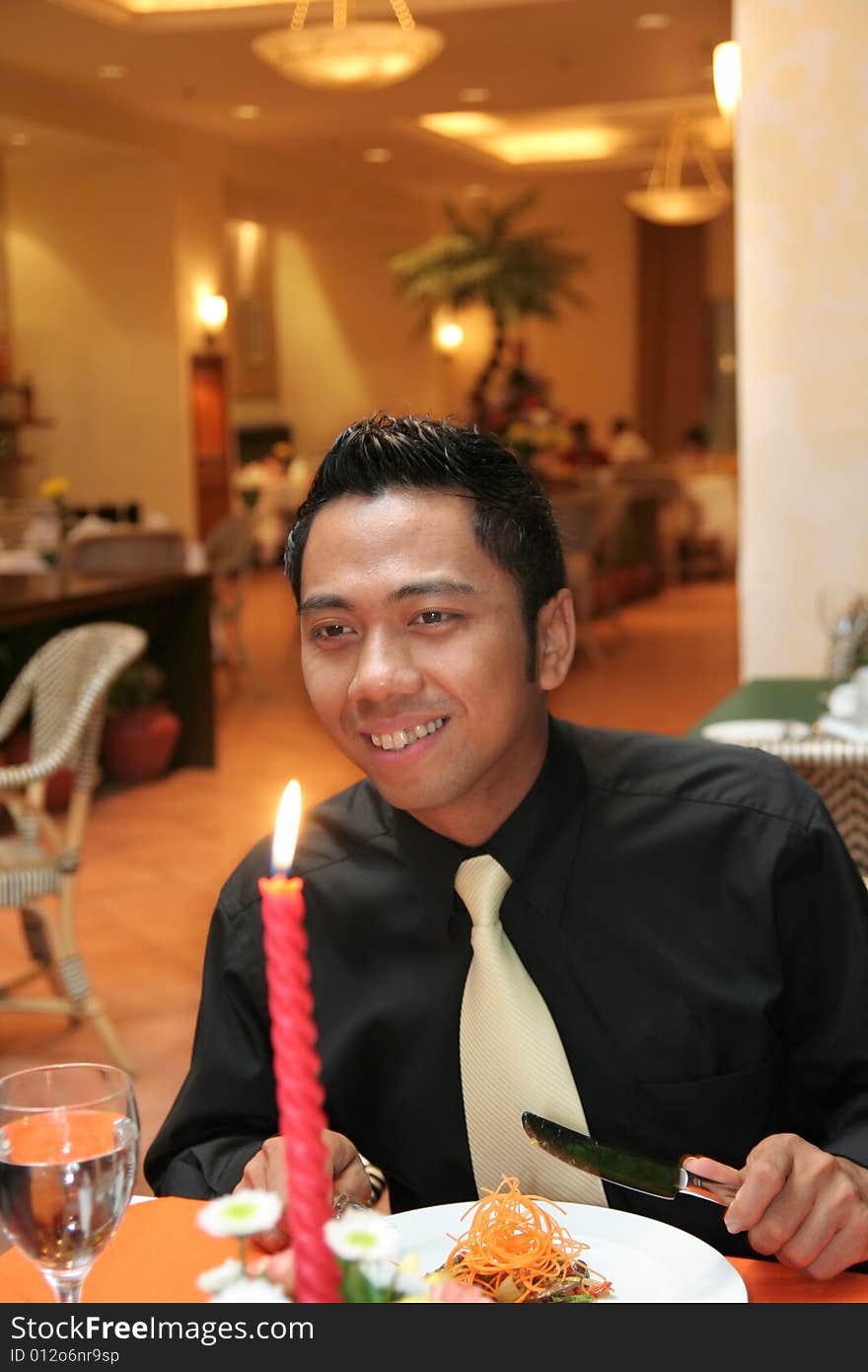 Man having dinner in restaurant