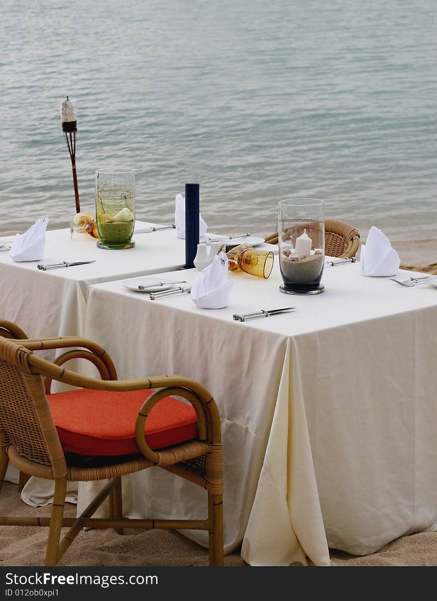 Table at a restaurant overlooking ocean views. Table at a restaurant overlooking ocean views.