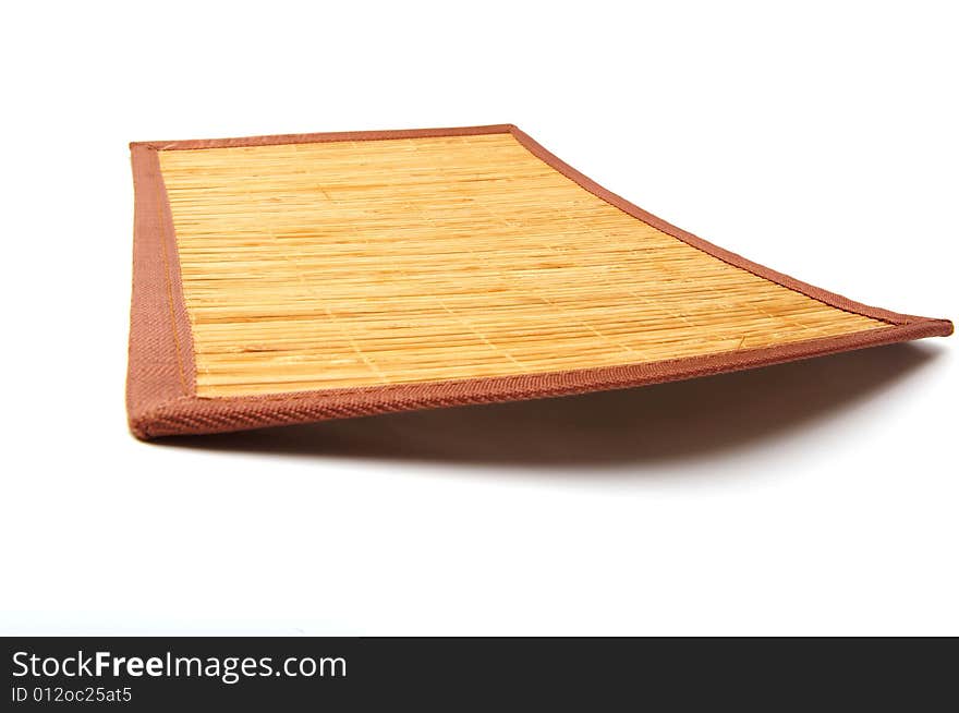 Wooden mat sheathed by the cloth