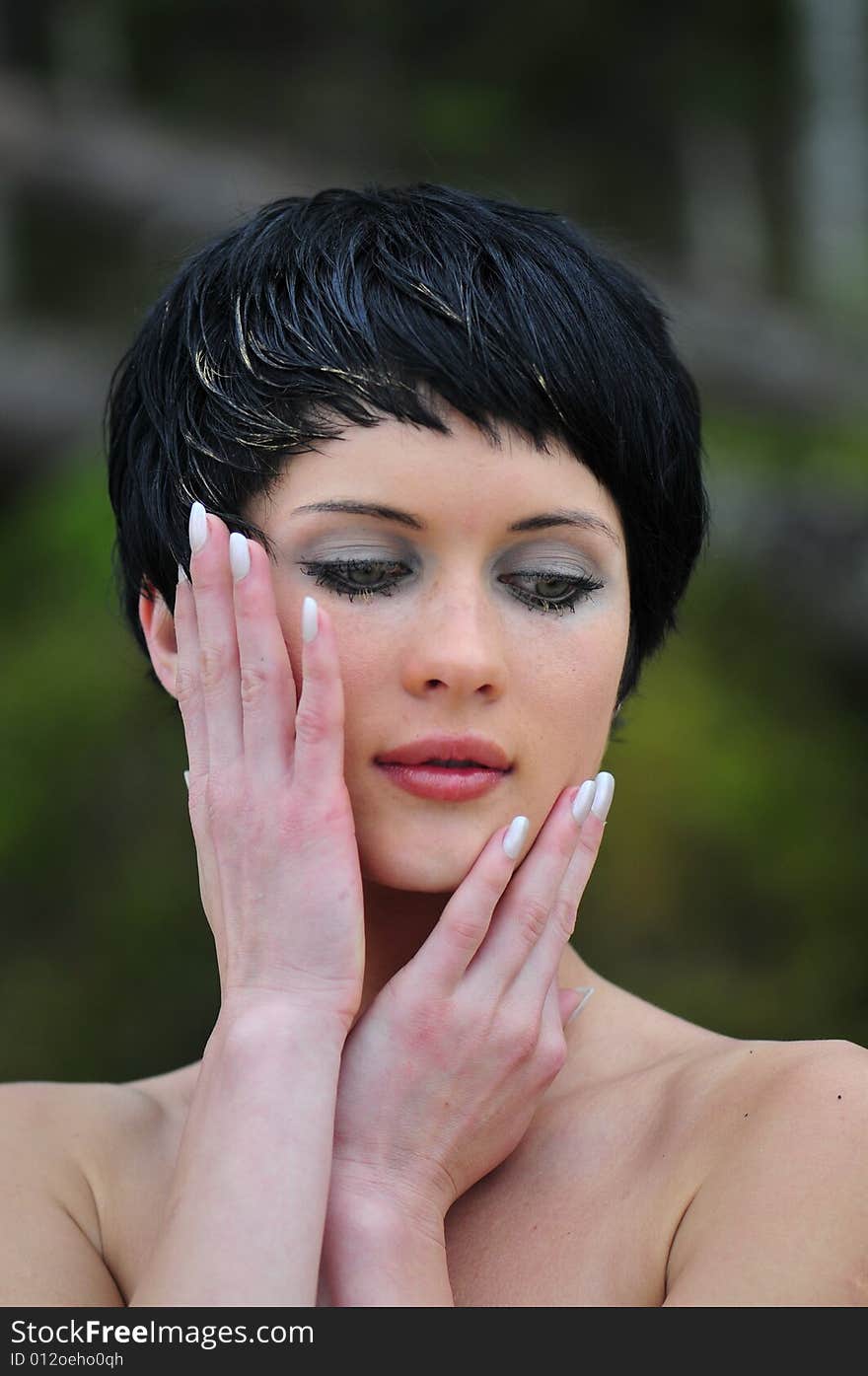 Portrait young beautiful woman in wood