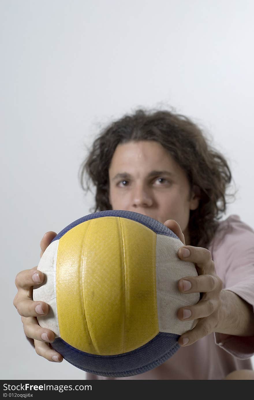 Man Holding Volleyball - Vertical