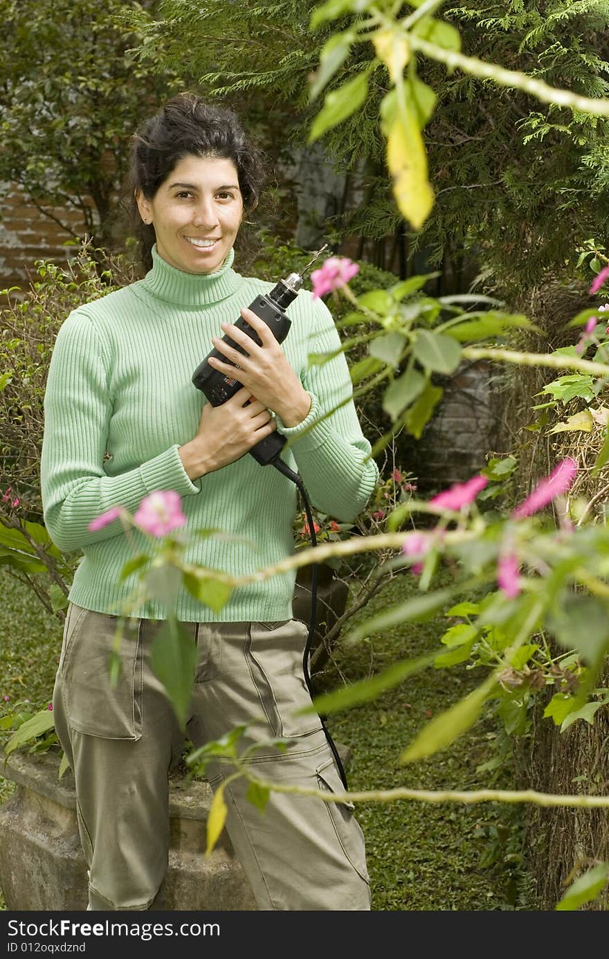 Woman smiling in the garden. Woman smiling in the garden.