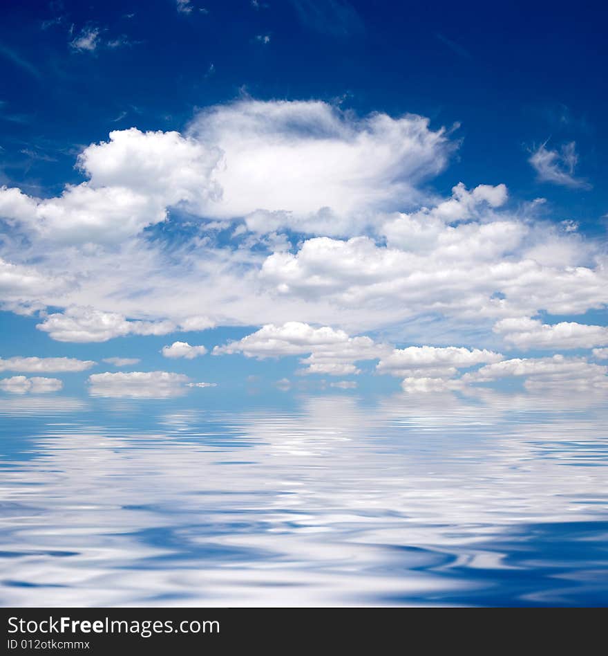 Blue sky over water background