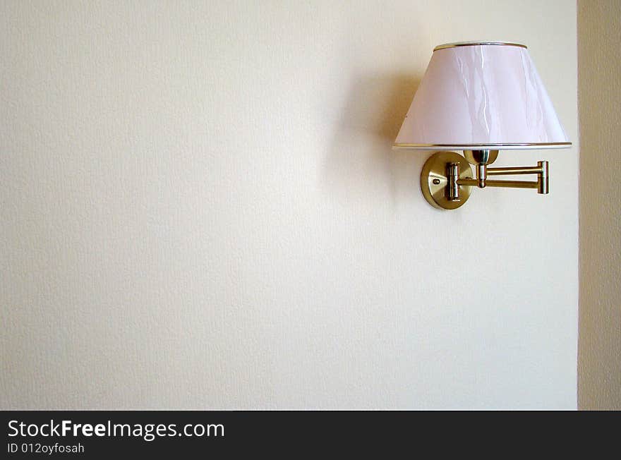 Lamp on the white wall in the hotel, Rostov, Russia. Lamp on the white wall in the hotel, Rostov, Russia