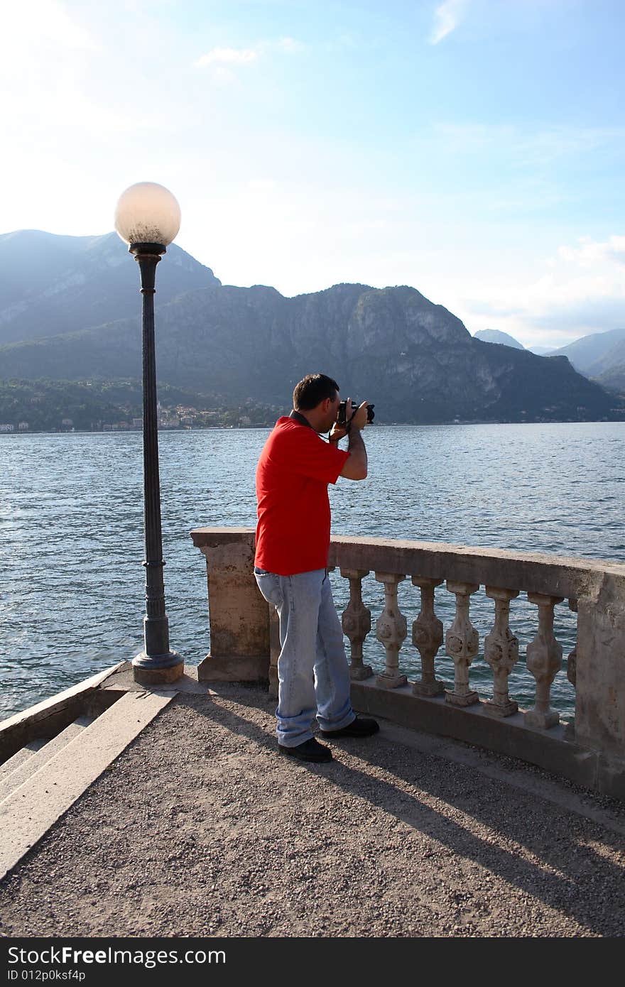 The man on the lake shore photographer