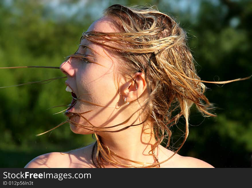 Attractive woman with wet hairs