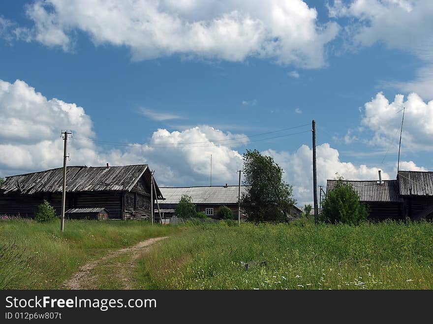 Village. sky and clouds