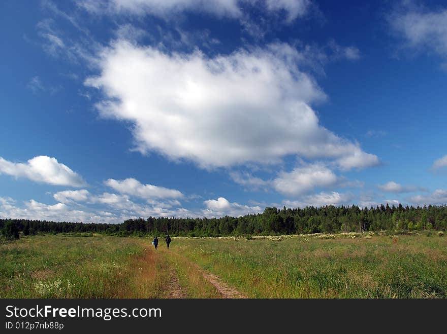 Village. sky and clouds