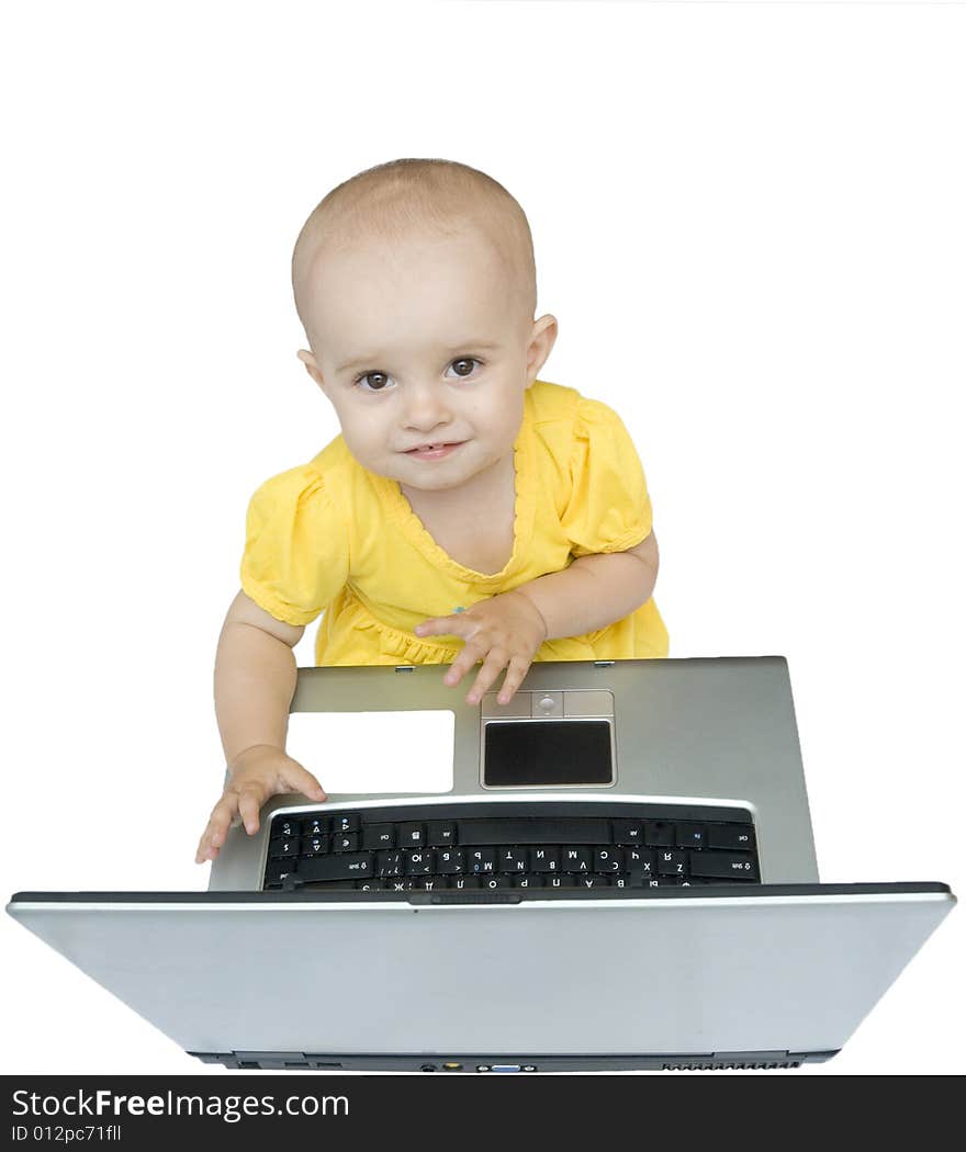 Little baby girl with laptop sitting and looking on top, isolated. Little baby girl with laptop sitting and looking on top, isolated