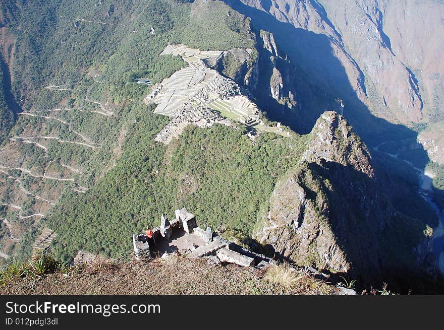 This is a shot of the fabled city of machu-picchu from atop of the sacred mountain huayna-picchu. This is a shot of the fabled city of machu-picchu from atop of the sacred mountain huayna-picchu