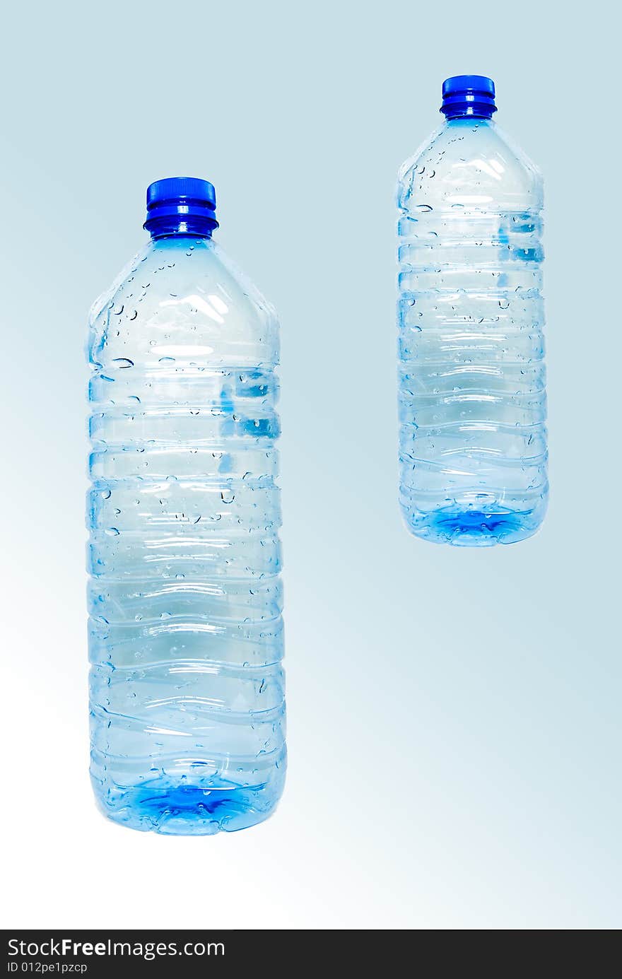 Recycling bottles on blue background