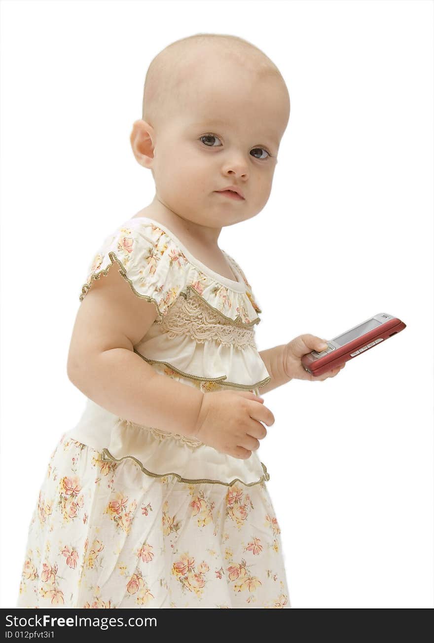 Little baby girl holds red cell phone. Little baby girl holds red cell phone