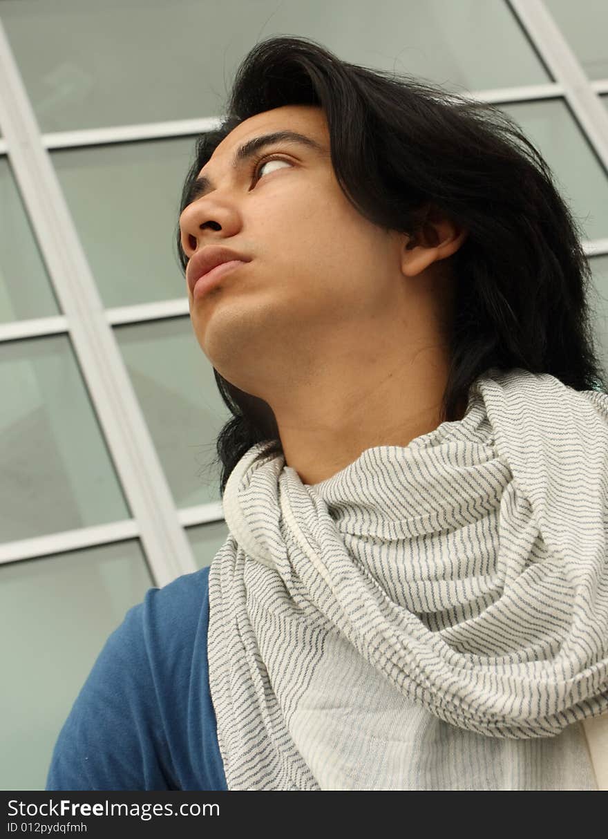 Image of a man looking up and away. Image of a man looking up and away