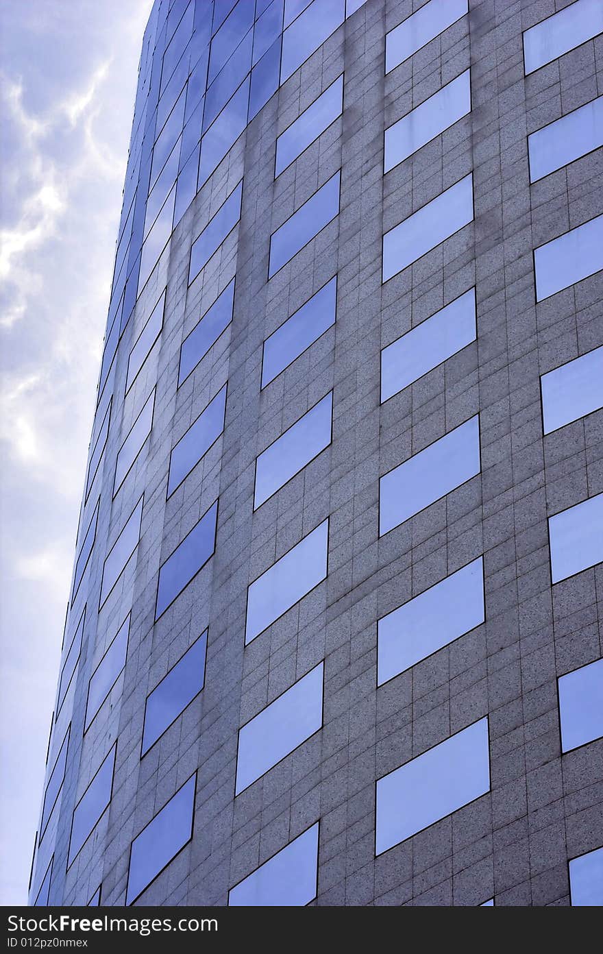 Office building. Glass skyscraper. Modern architecture detail.