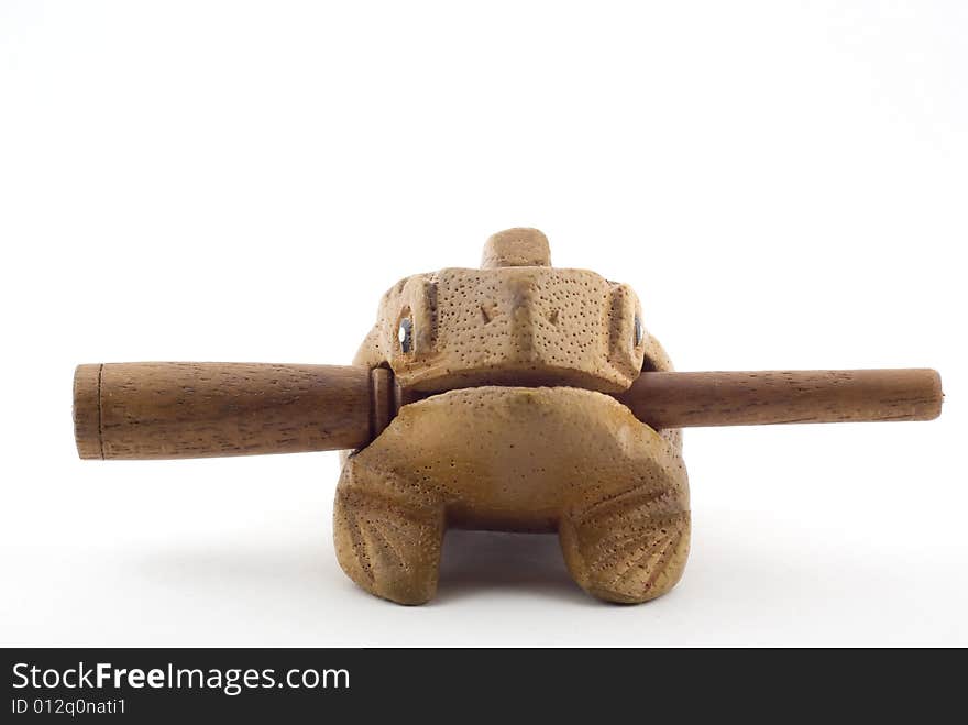 Ethnic toy- wooden frog from Canarian islands