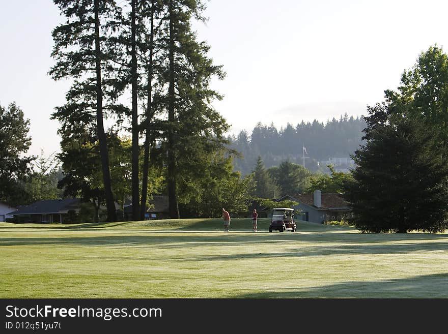 Couple Playing Golf - Horizontal