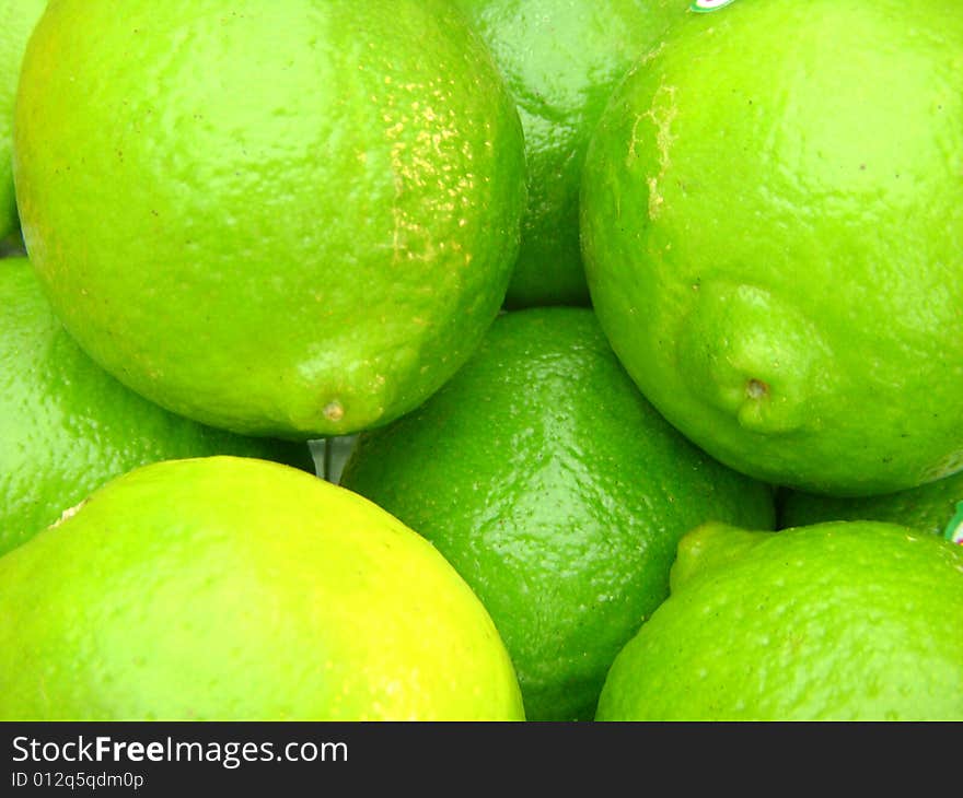 Group of green limes.Horizontally framed photo. Group of green limes.Horizontally framed photo.