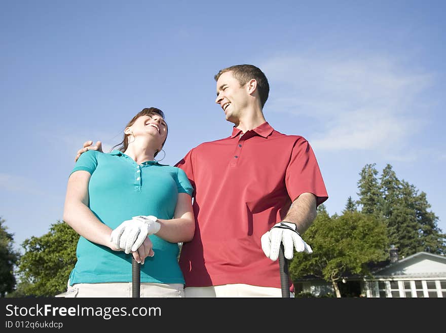 Couple Standing on Gof Course - Horizontal