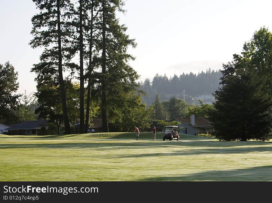 Couple Playing Golf - Horizontal