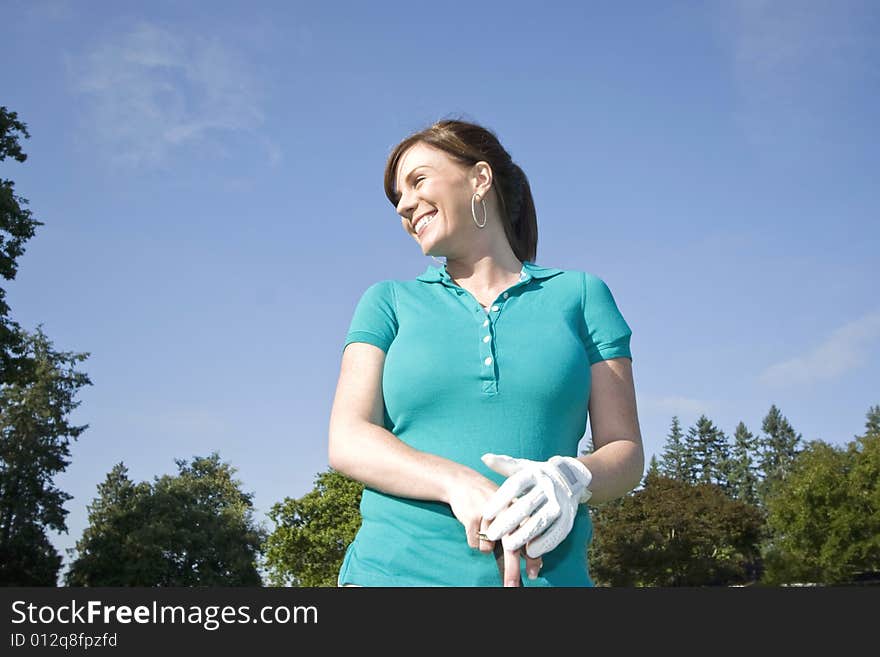 Woman Standing on Golf Course - Horizontal