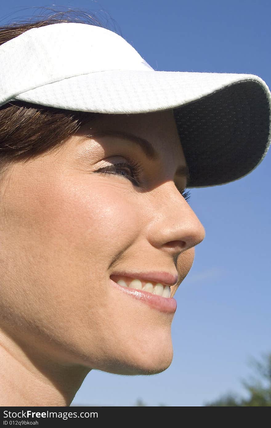 Profile of Smiling Female Golfer - Vertical