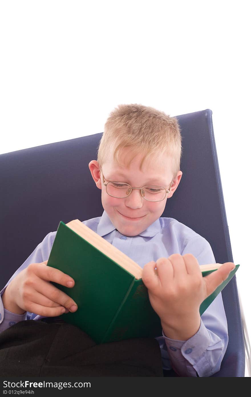 Boy reading interesting book