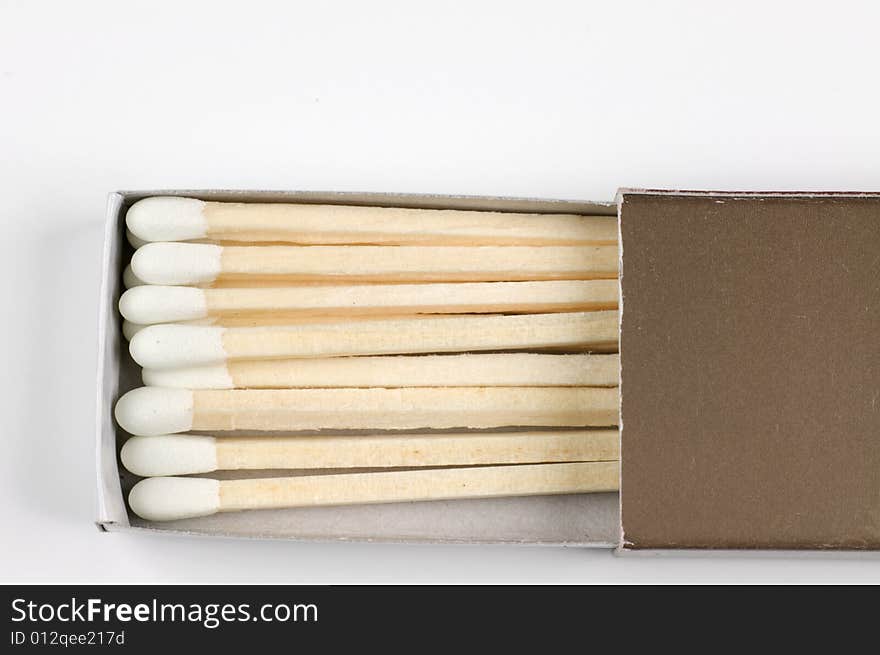 Wooden match sticks in paper matchbox - macro