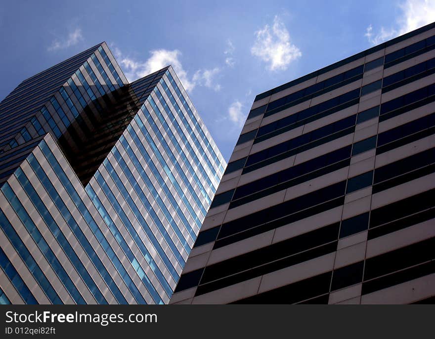 View looking up at office buildings in a major city in North America, USA. View looking up at office buildings in a major city in North America, USA