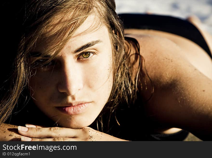 Green eyed beauty on the beach