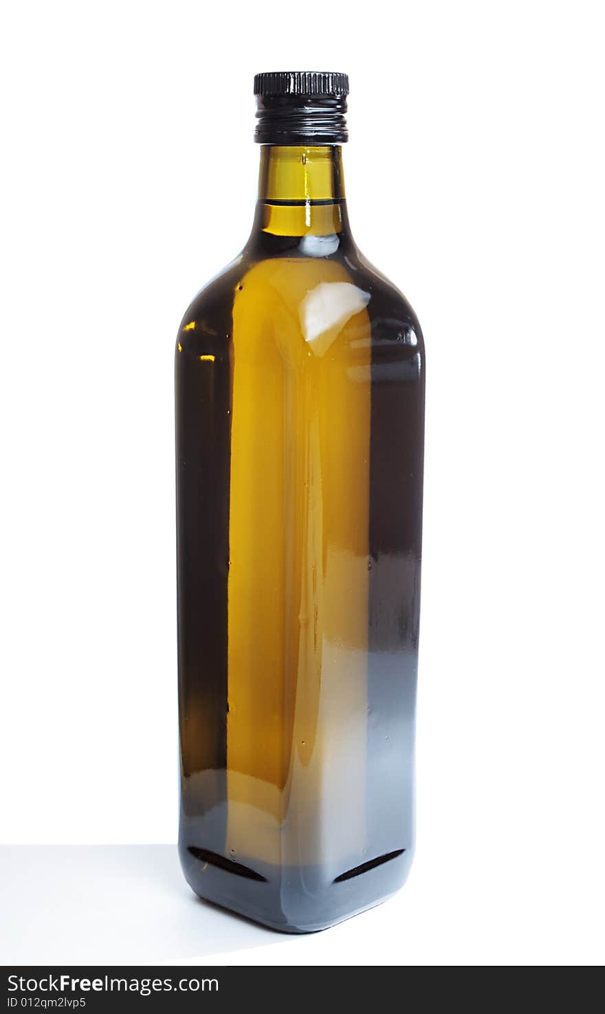 Bottle with olive oil on a white background