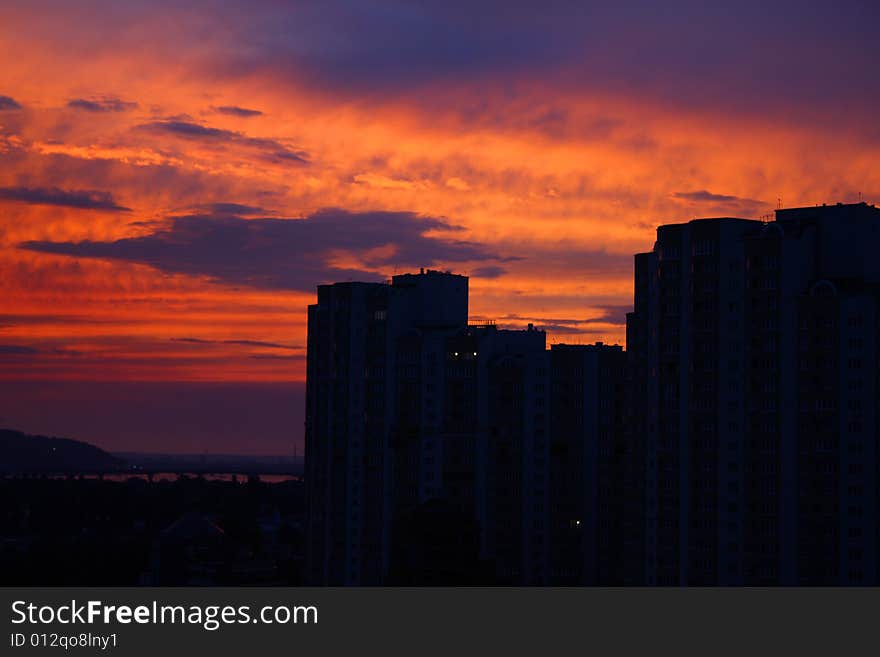 Buildings and sunset sky. Evening silhouettes.