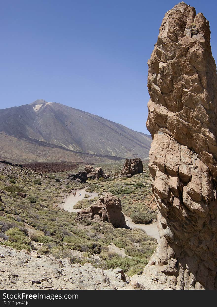 A young family walking along the path to Mount Teide