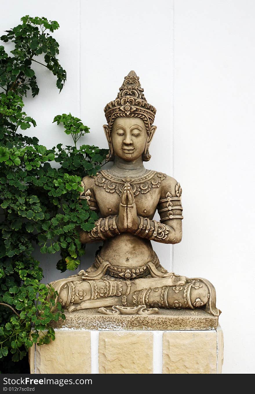 Traditional stone carved Thai statue - travel and tourism.