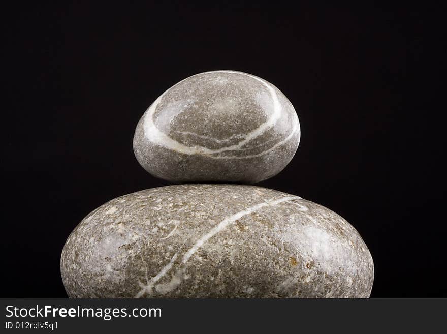 Zen stones on the black background