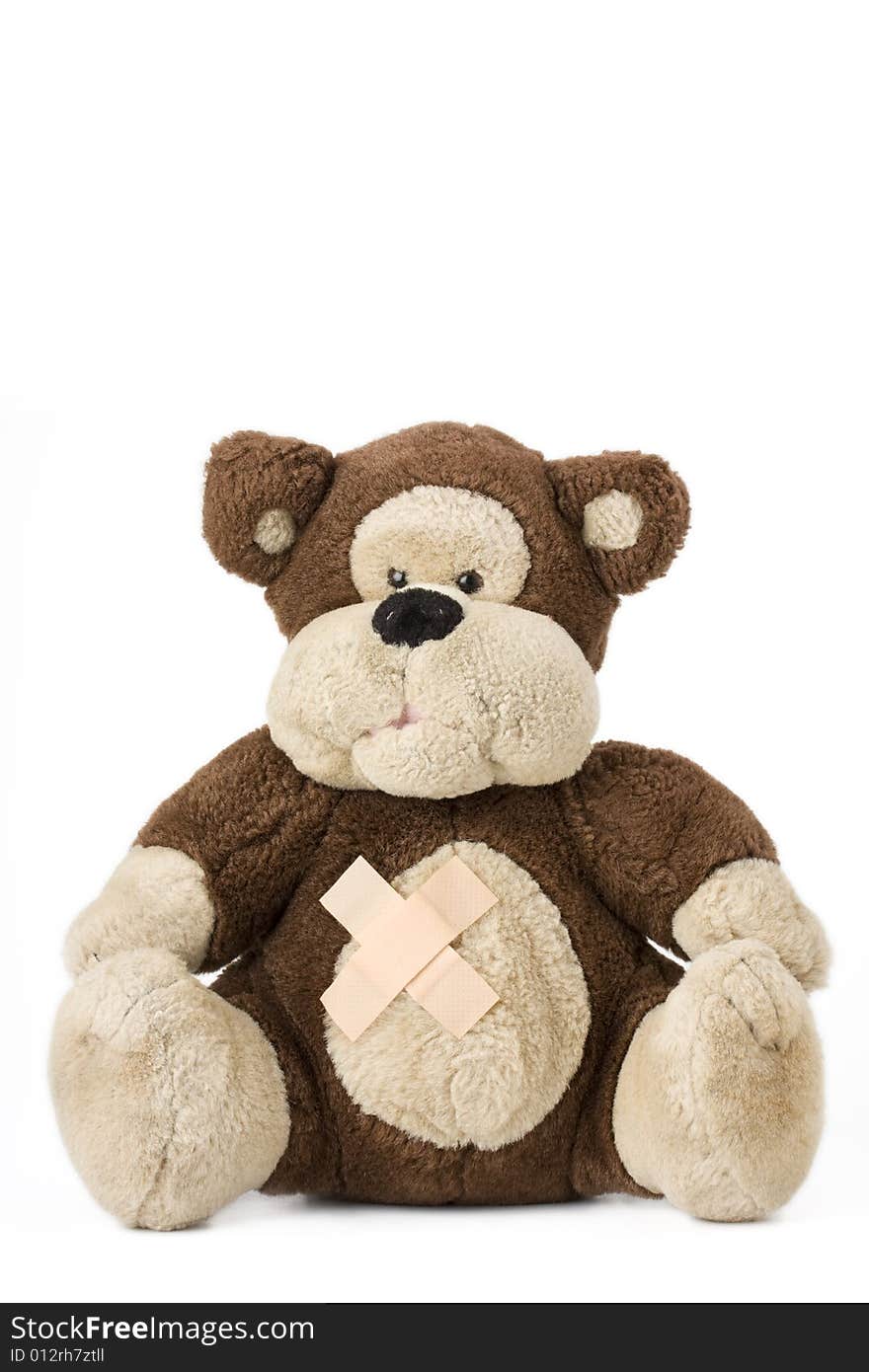 Teddy bear with bandaids