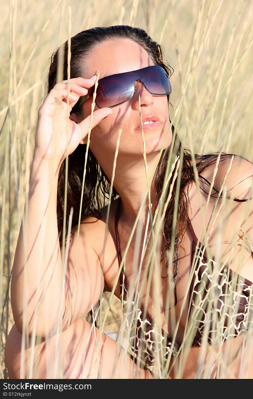 Young woman near of beach in the sea