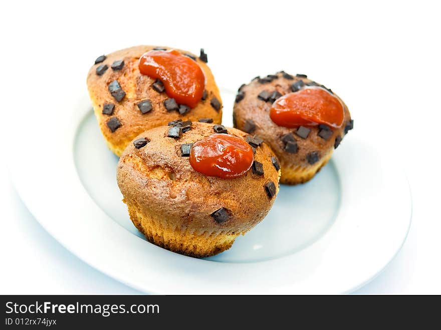 Chocolate muffins with decoration - isolated on wh