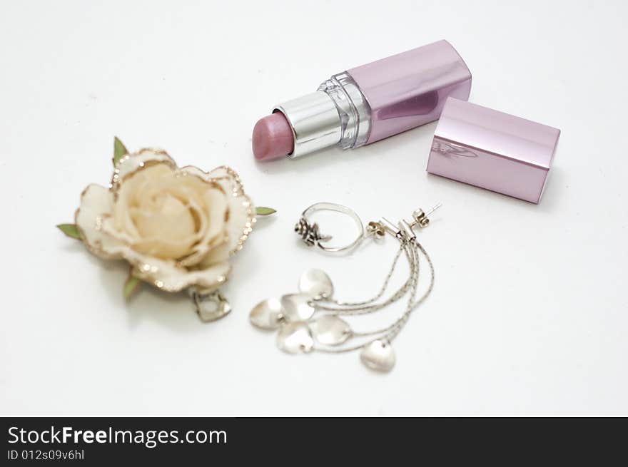 Lipstick and ear ring